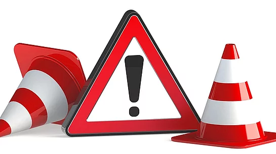 Symbolbild mit Warndreieck